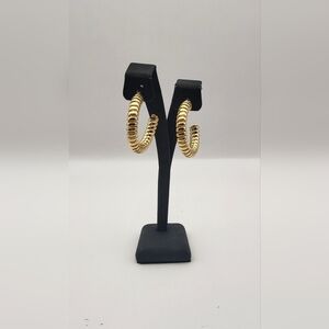 Gold Tone spiral hoop earrings